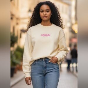 #043 White Fox Boutique UNISEX Cream Sweatshirt with Pink Logo